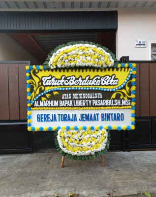 Papan Bunga Duka di Bandar Petalangan